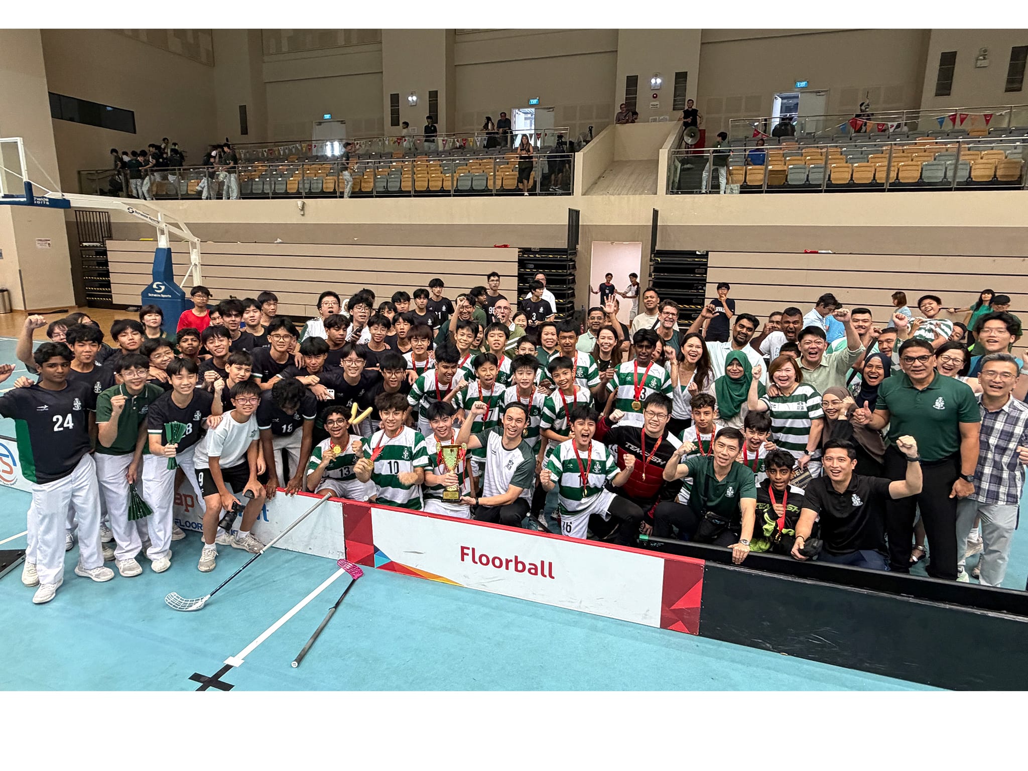 The team with staff, coaches and parents