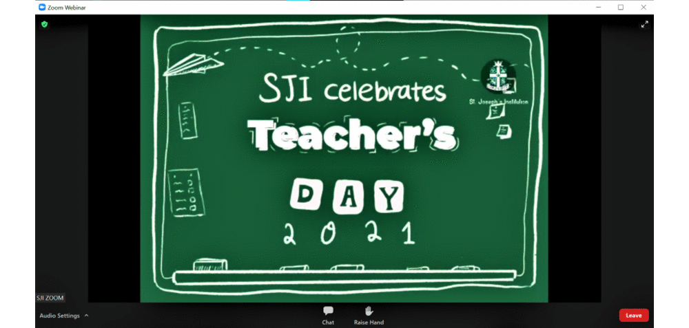 Green chalkboard slide on Zoom reading "SJI celebrates Teacher's Day 2021" in white text.