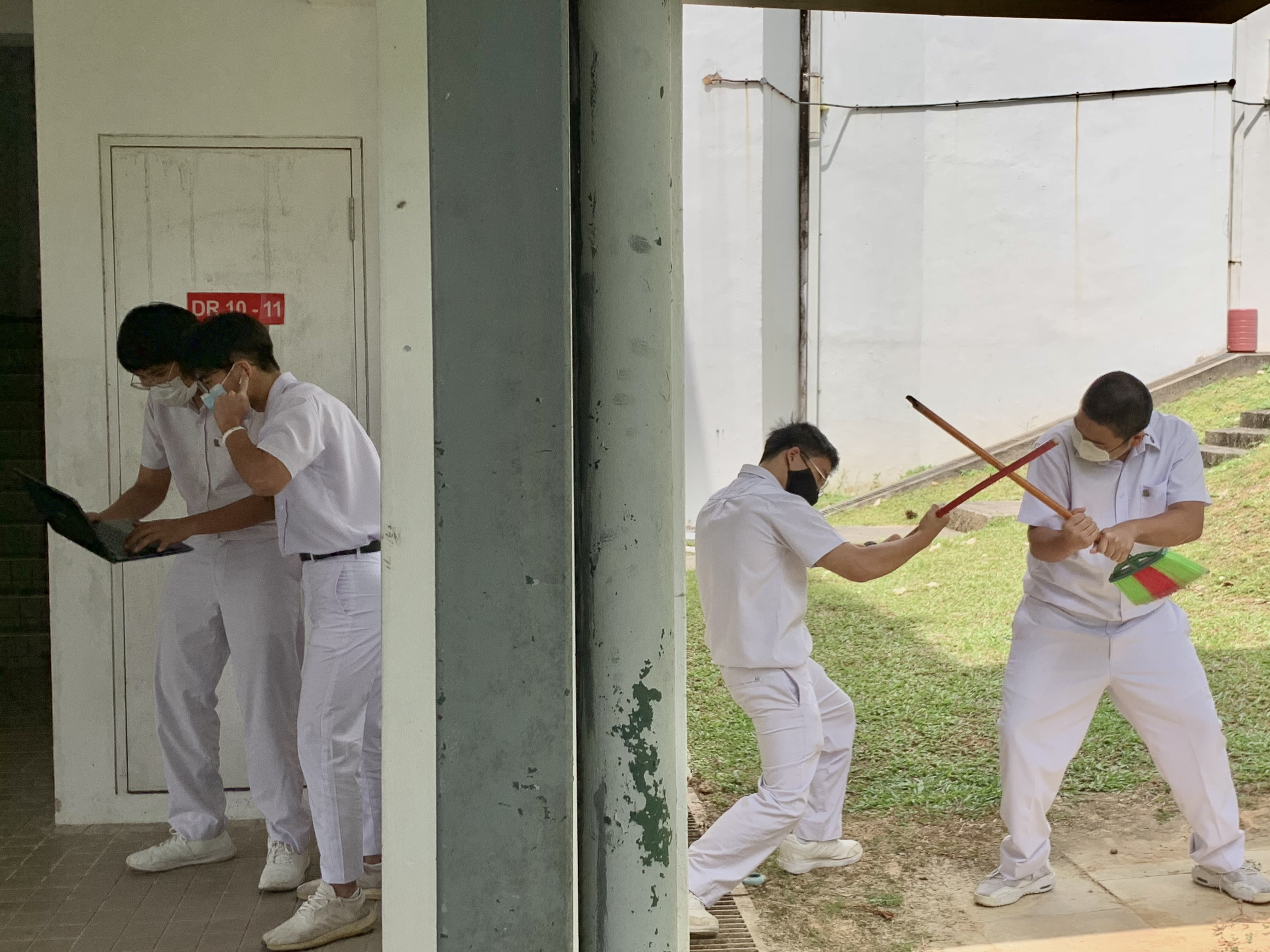 Two men in white uniforms use sticks like swords outside, while two others in white stand by a door with a laptop.