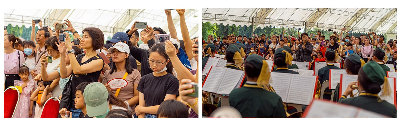 A crowd records with phones on the left, while uniformed band members perform with sheet music before an audience on the right.