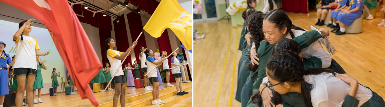 Students wave red and yellow flags on a stage, while others share a group hug on a gym floor.