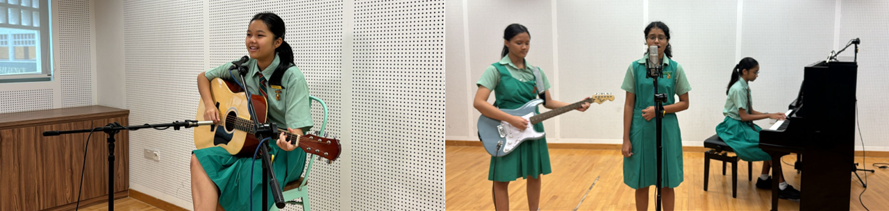 Four schoolgirls in green uniforms perform music, playing acoustic guitar, electric guitar, singing, and piano.