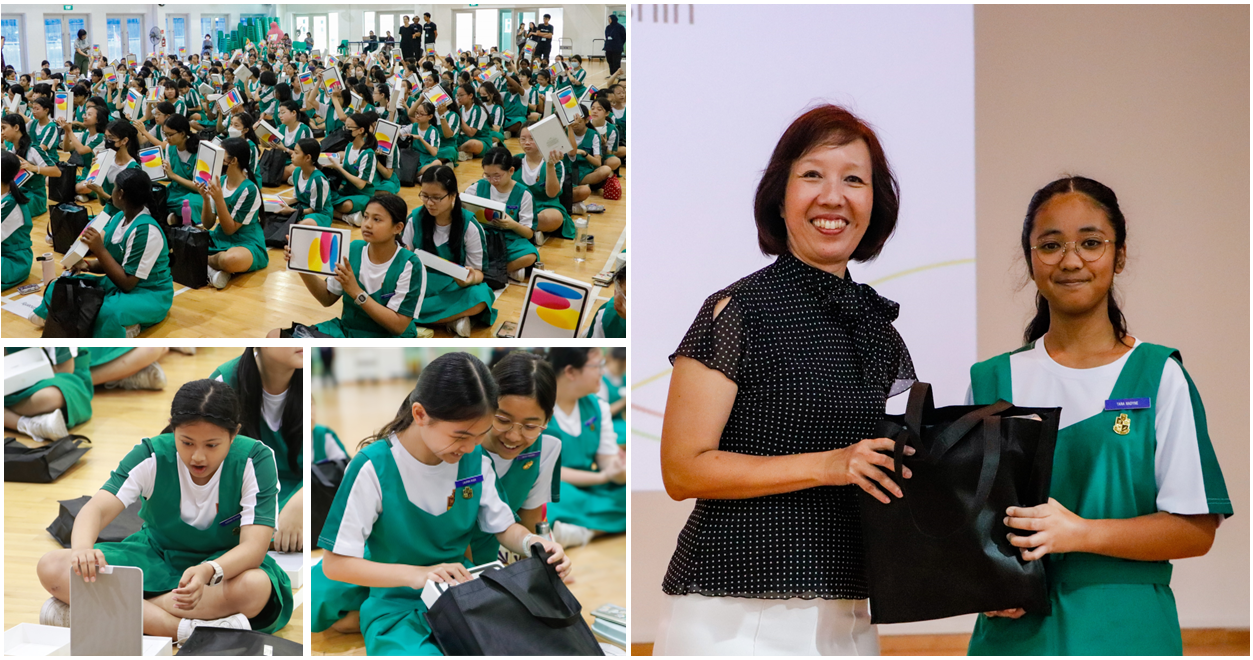 Students in green uniforms receive tablets and bags at a school event, with a woman presenting a gift to one student.