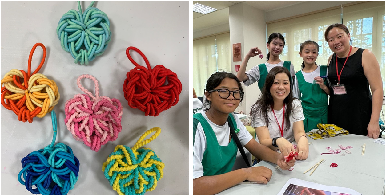 Colorful knotted rope ornaments beside a group of smiling students and adults making crafts at a table.