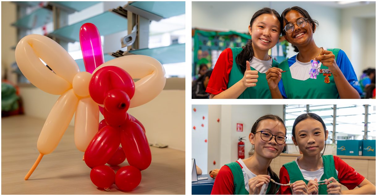 A balloon animal sculpture beside two pairs of smiling girls in green aprons holding handmade crafts and bracelets.