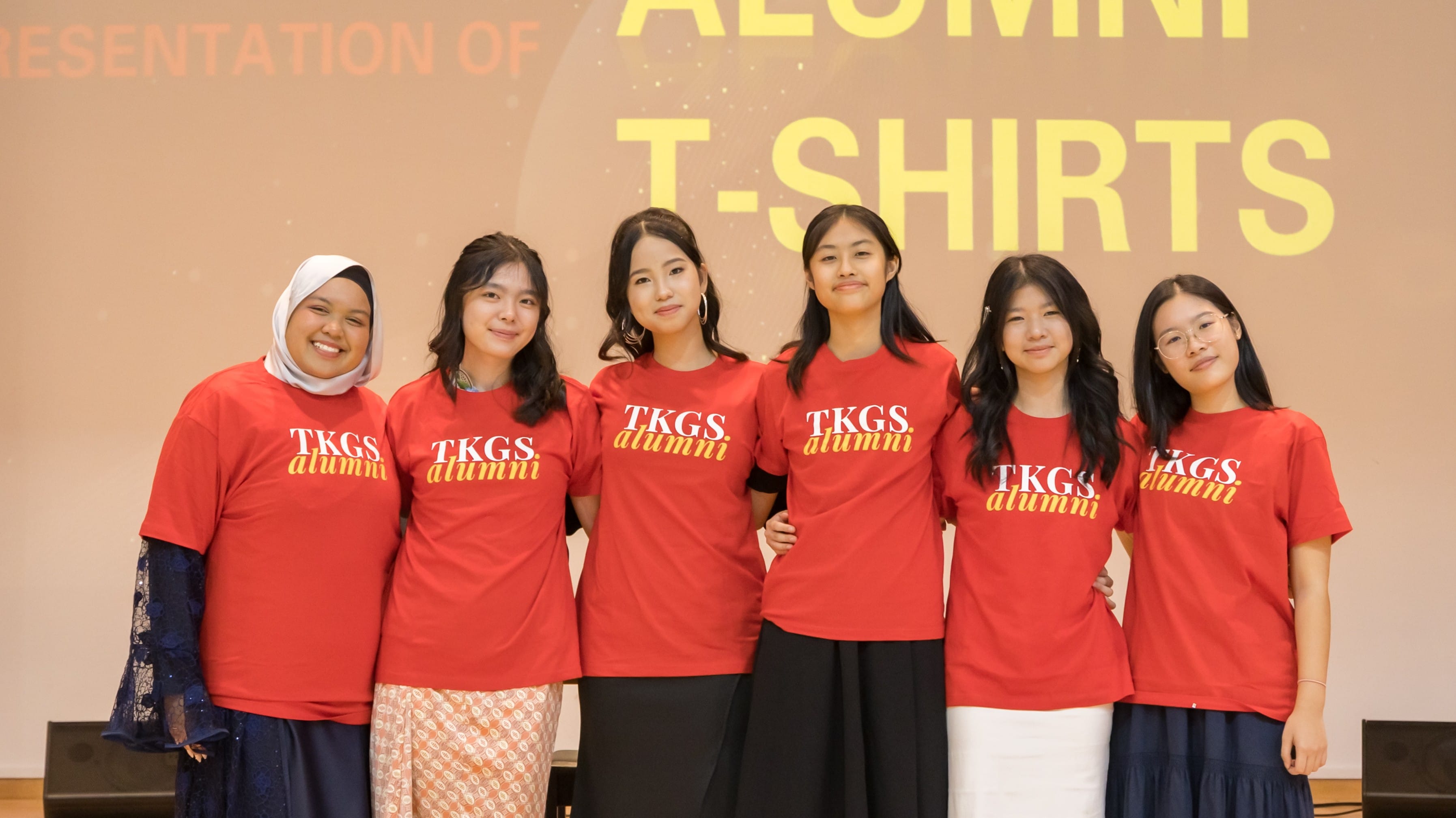 A group of students embracing their new identity as Alumni of TKGS