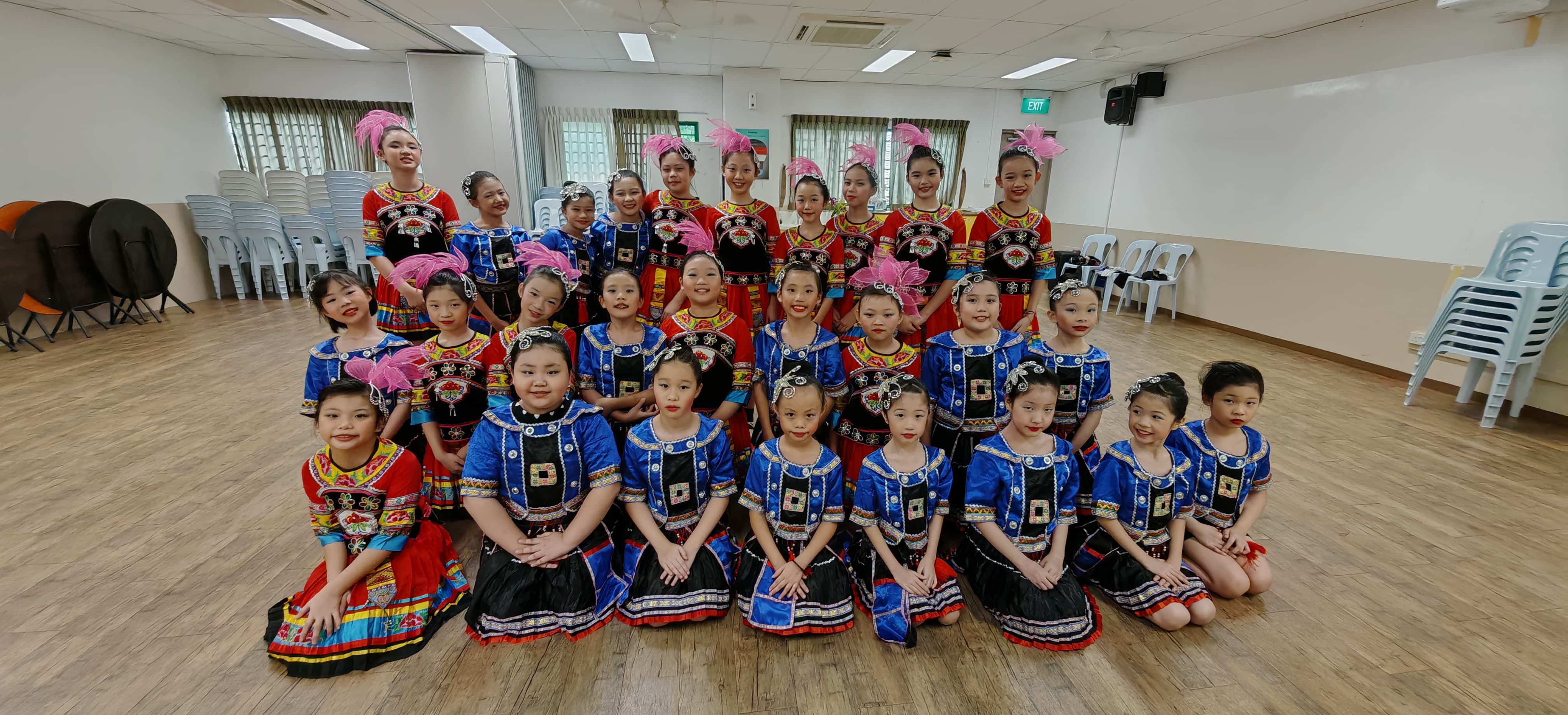 Dancers beaming with joy after a performance