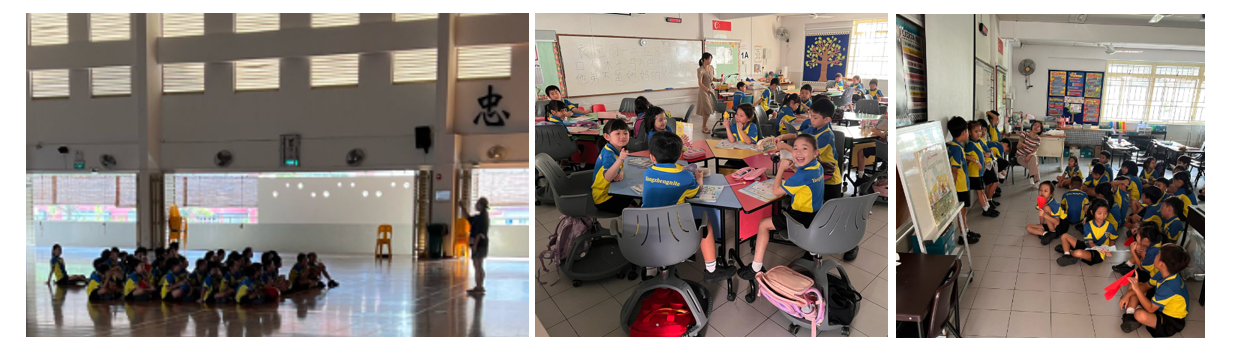 Young students in blue and yellow uniforms sit in a hall, work at classroom desks, and gather around an easel.