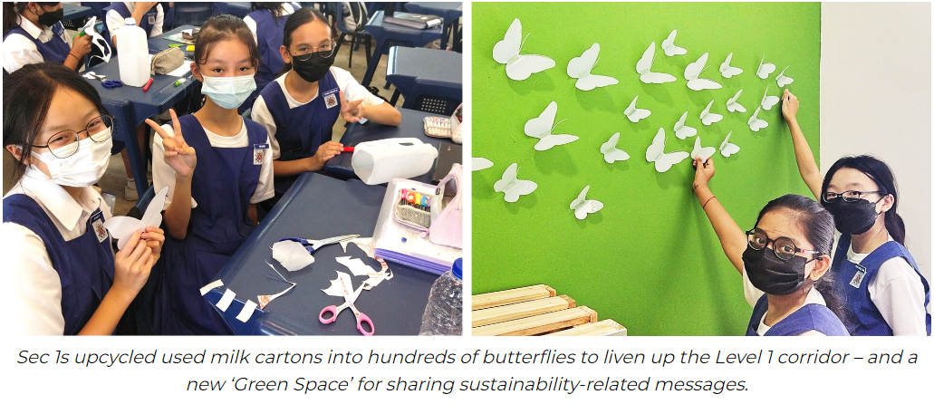Students in uniforms and masks craft butterfly cutouts from milk cartons, then display them on a green wall.