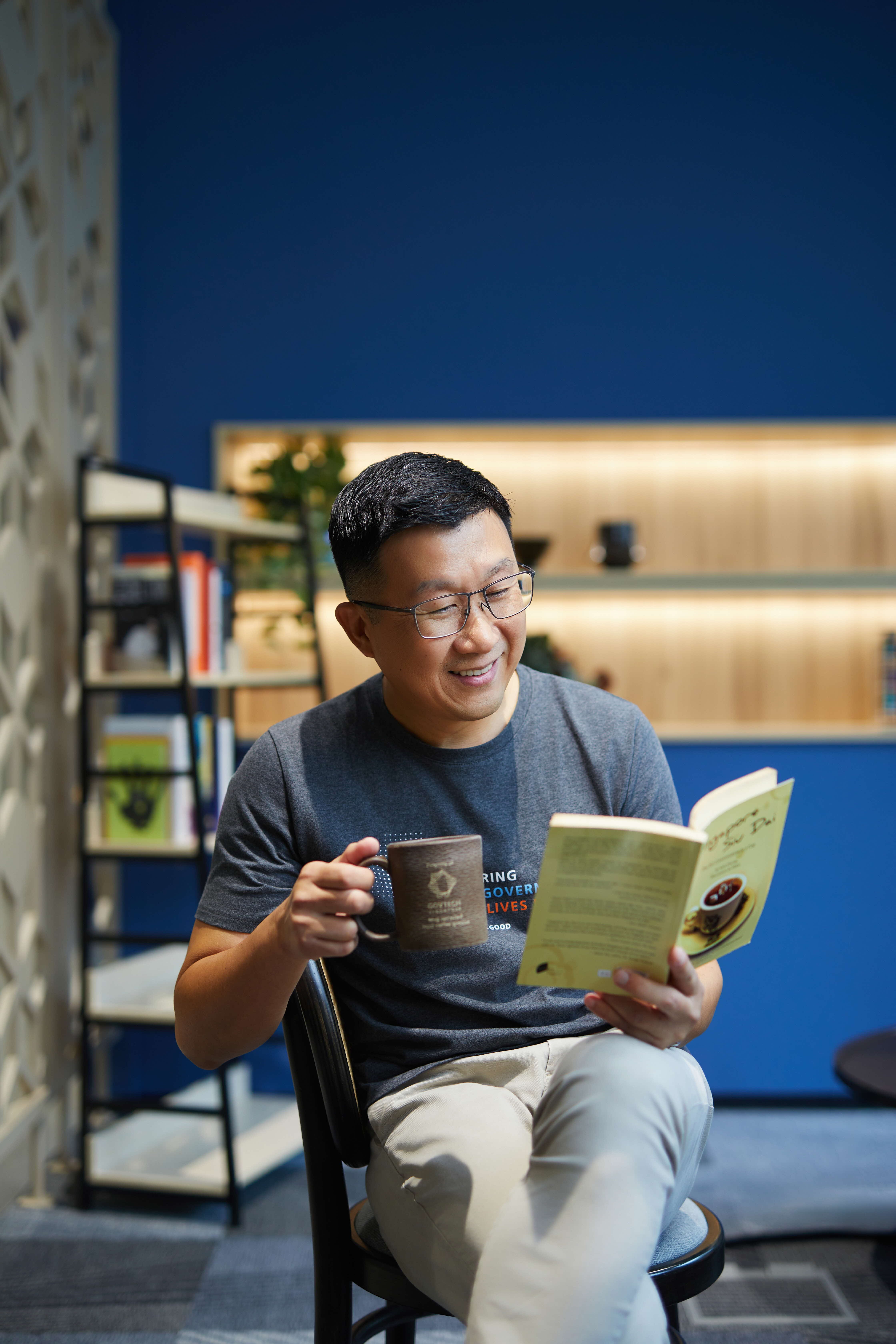 Image of person reading a book