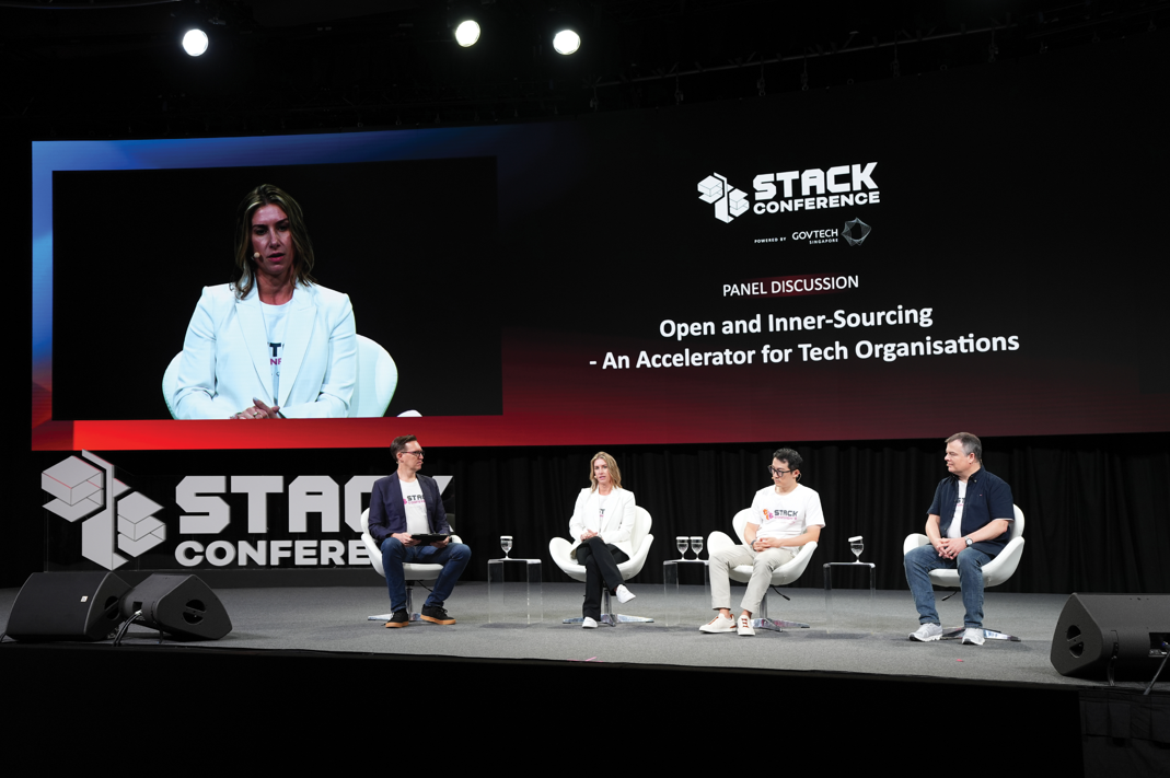 Image shows panelists at STACK Conference