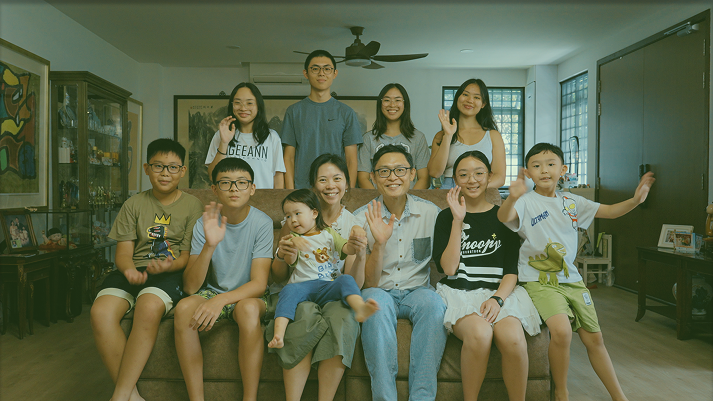 Image of family of nine kids using LifeSG