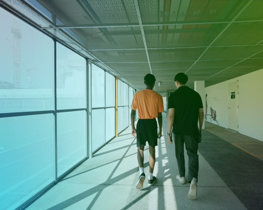 Image of a youth guidance officer supporting youths.