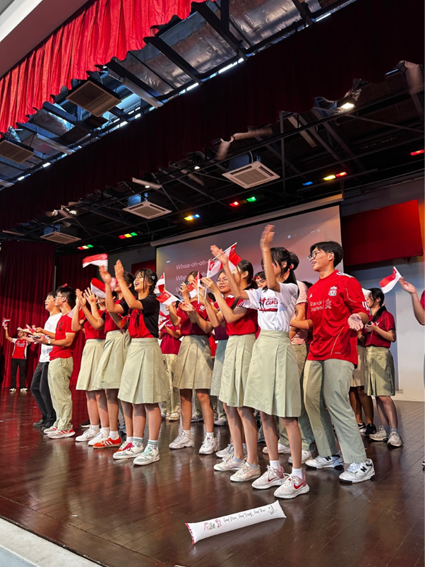 Student Councillors leading the student population in National Day cheers and songs.