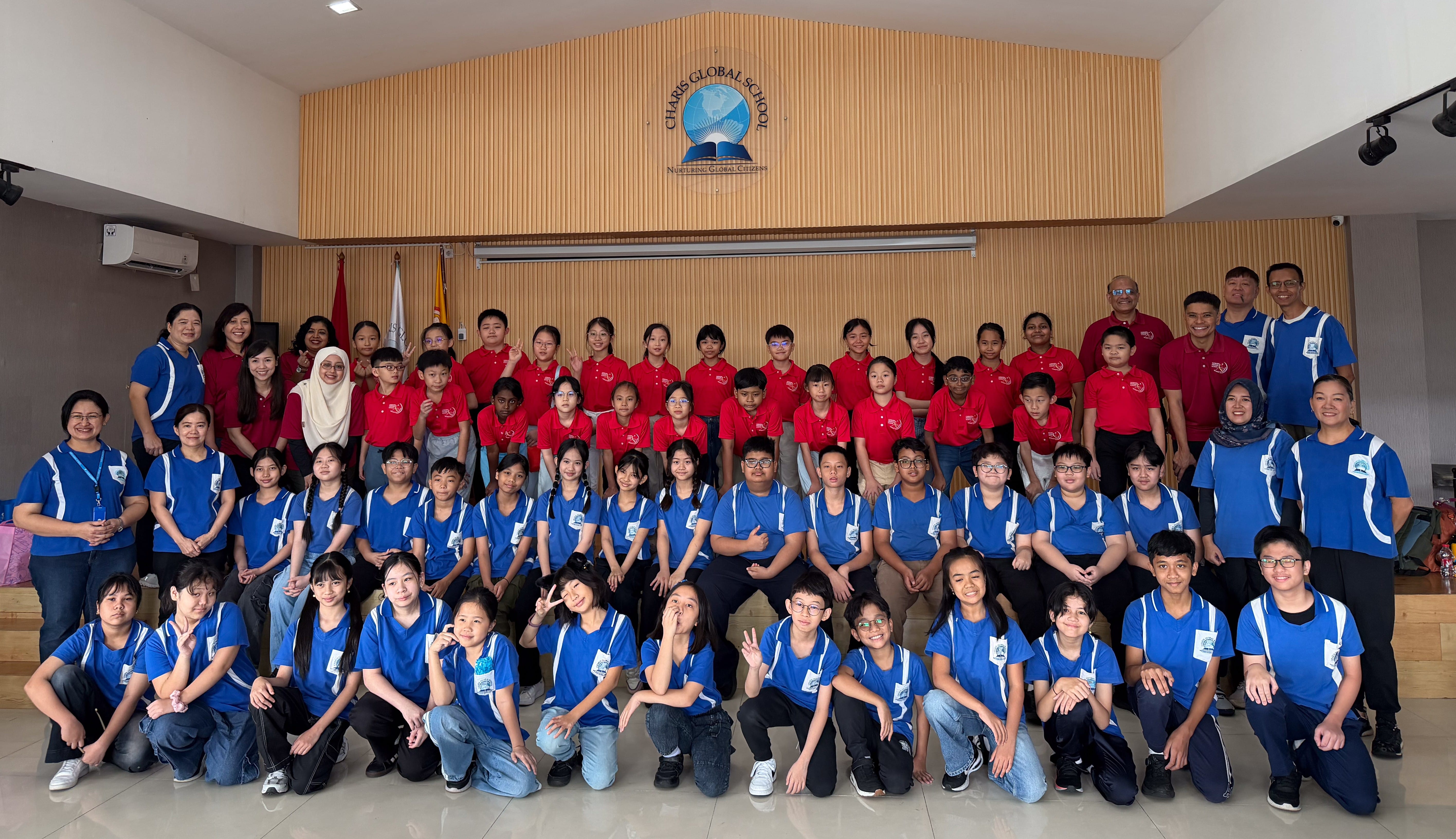 Canberra Primary School and Charis Global School students and teachers gathered for a group photograph during their cultural exchange programme.