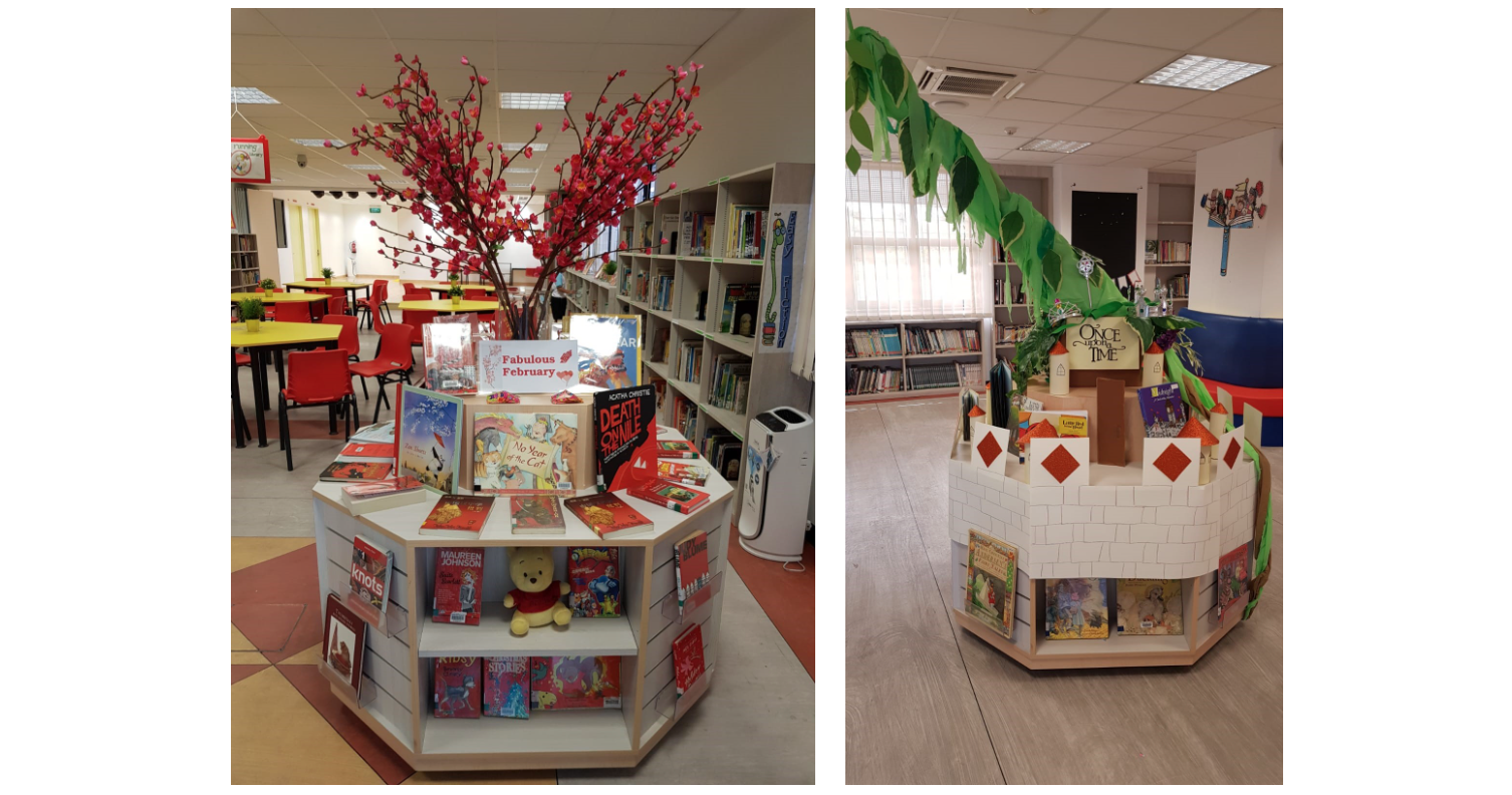 Two library book displays: one with red cherry blossoms and a Fabulous February theme, one castle-shaped with a beanstalk decoration.