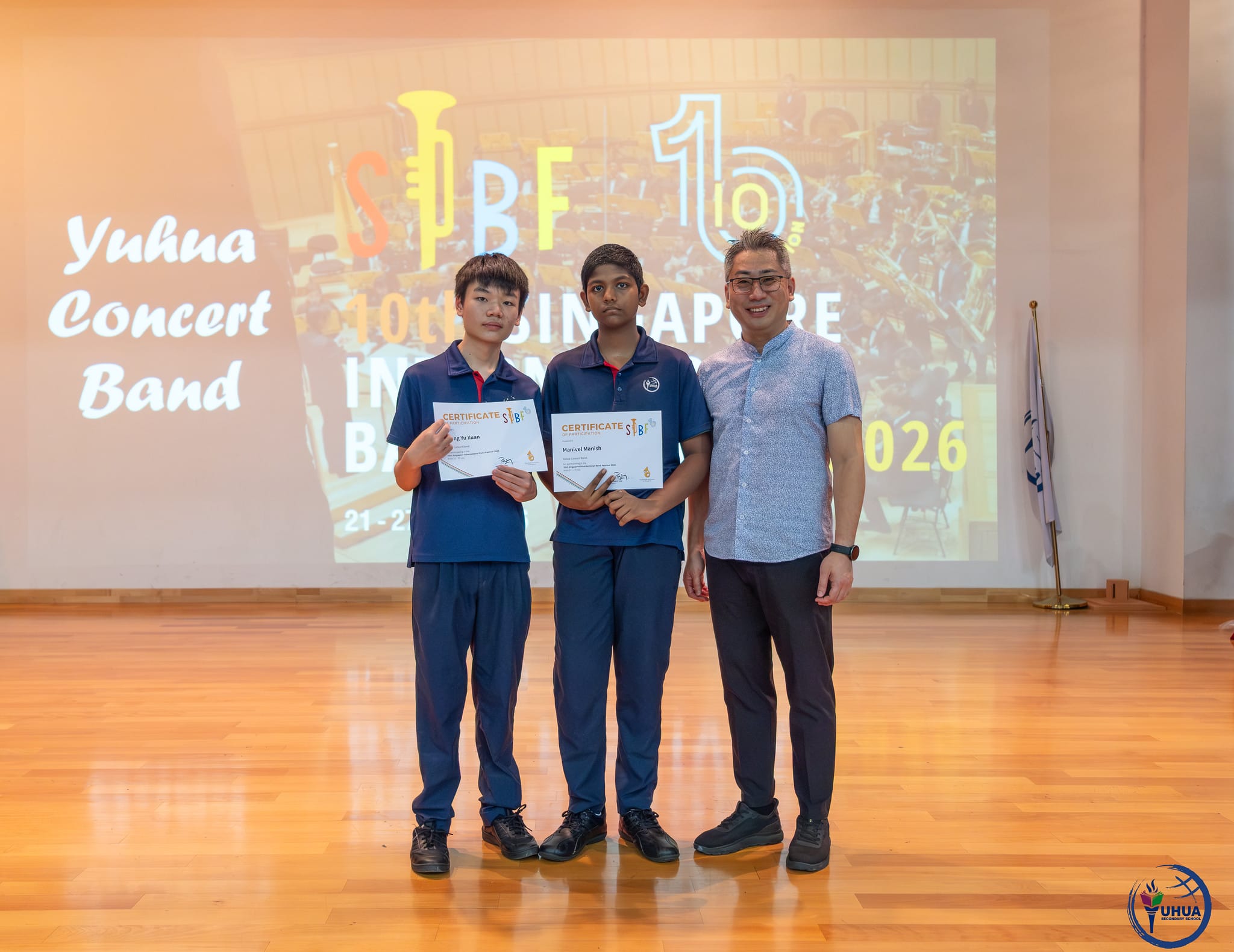 Posing with certificate