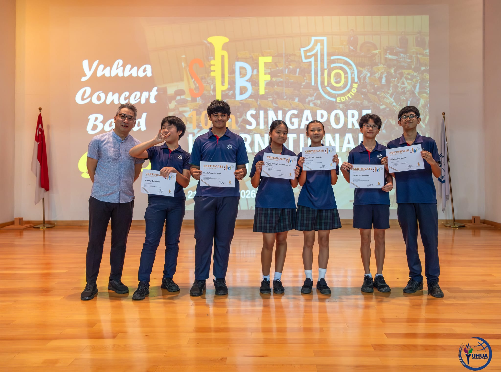 Posing with certificate