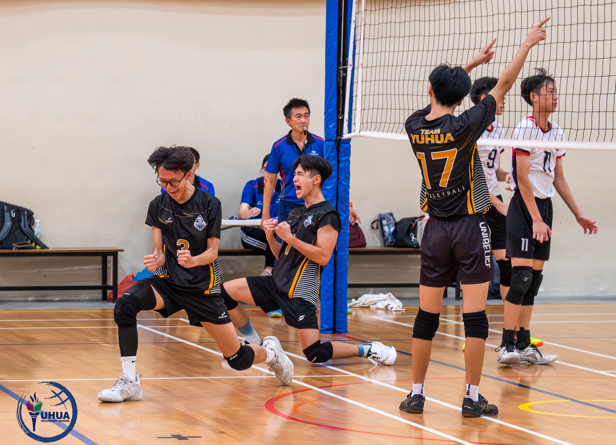 students cheer after scoring a point 