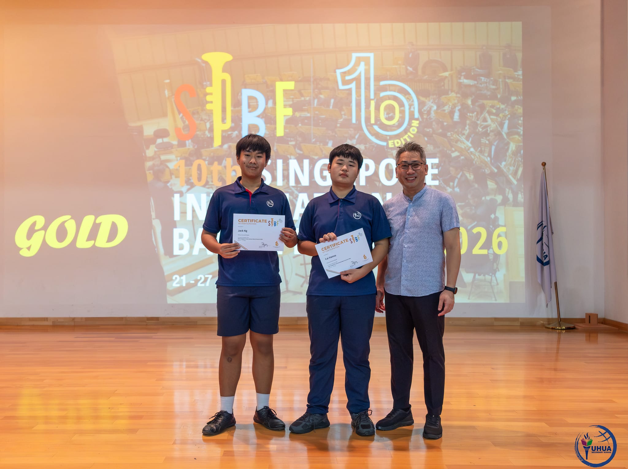 Posing with certificate
