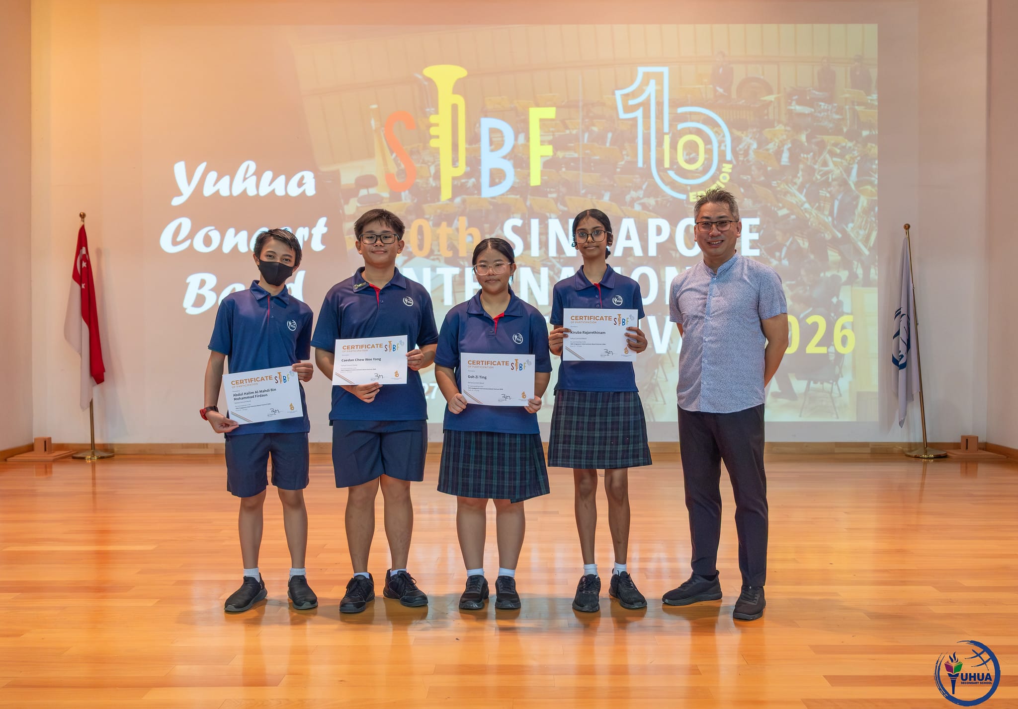 Posing with certificate