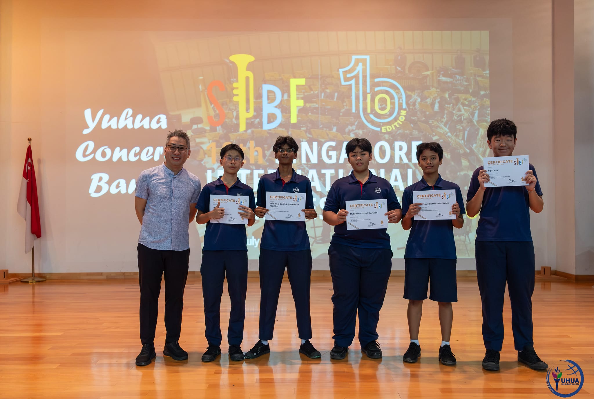 Posing with certificate