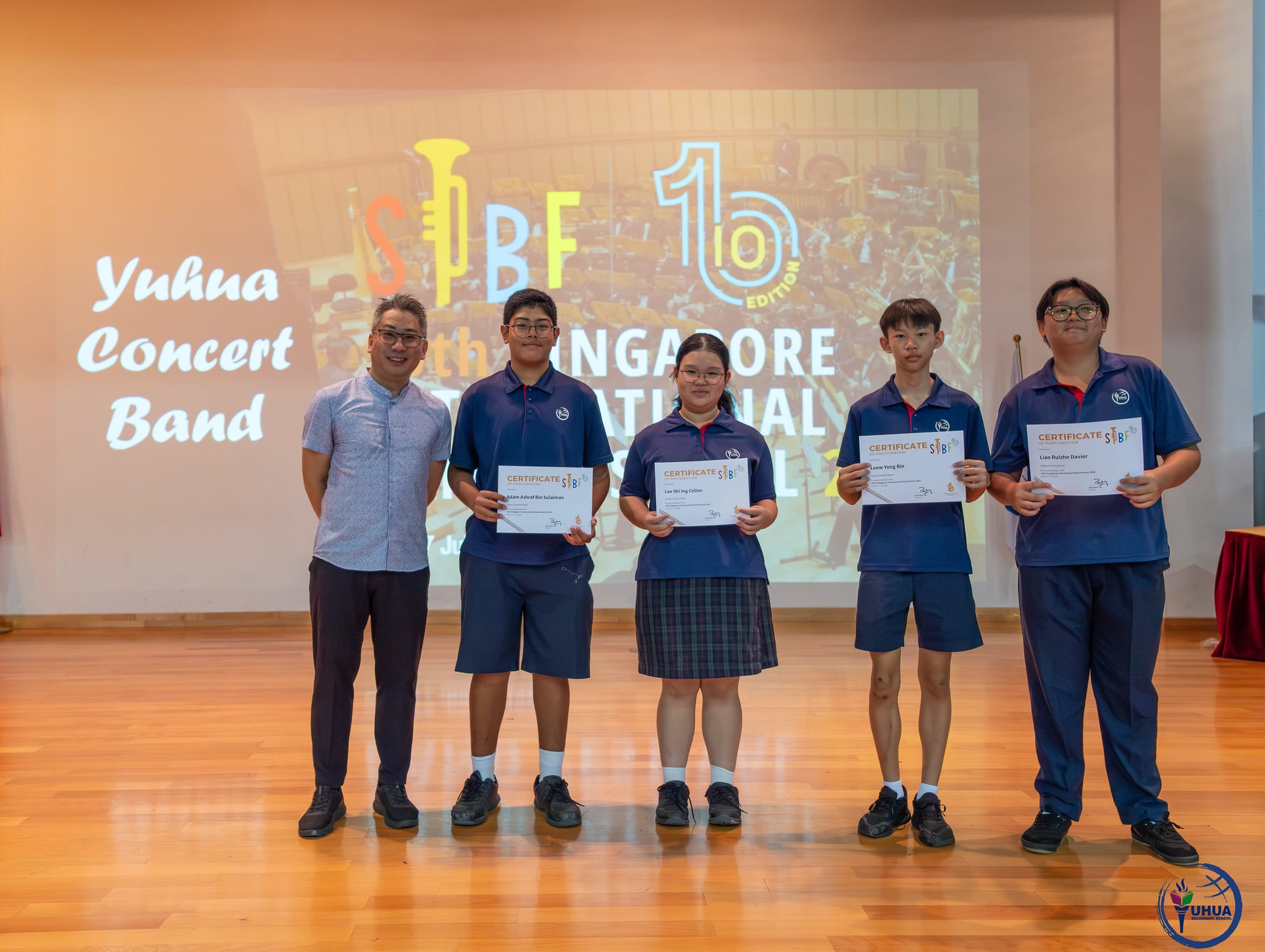 Posing with certificate