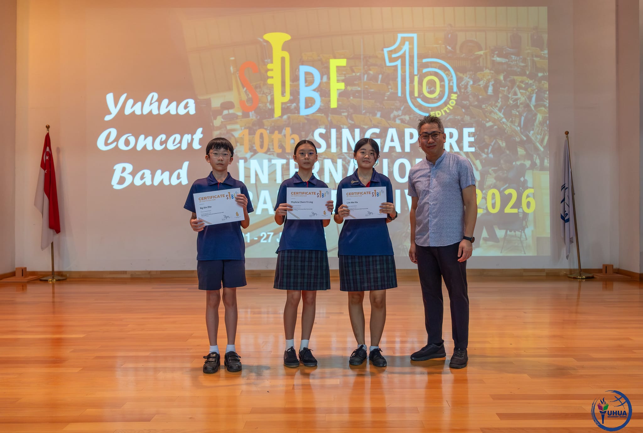 Posing with certificate