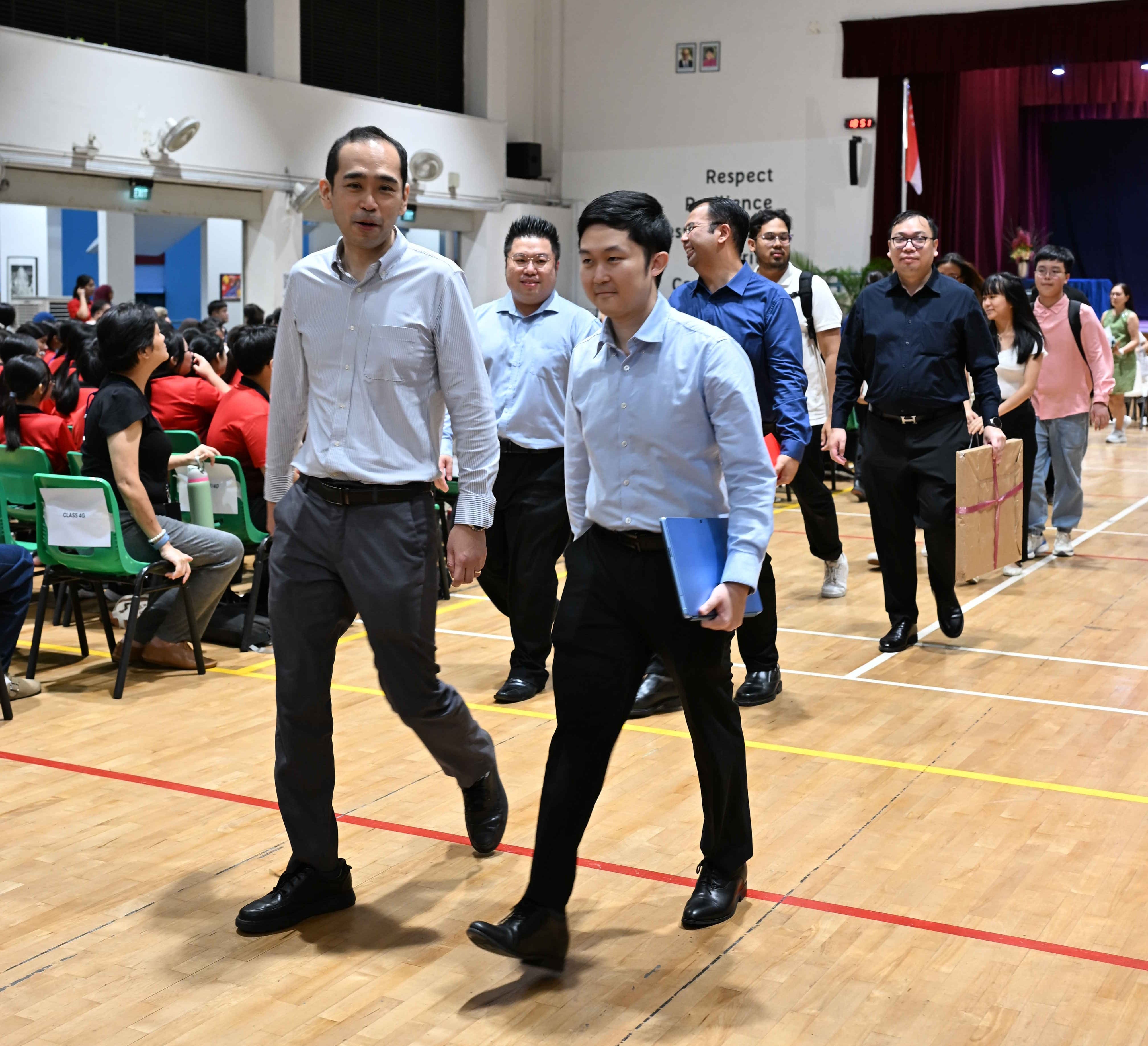 GOH walking with Mr Ng