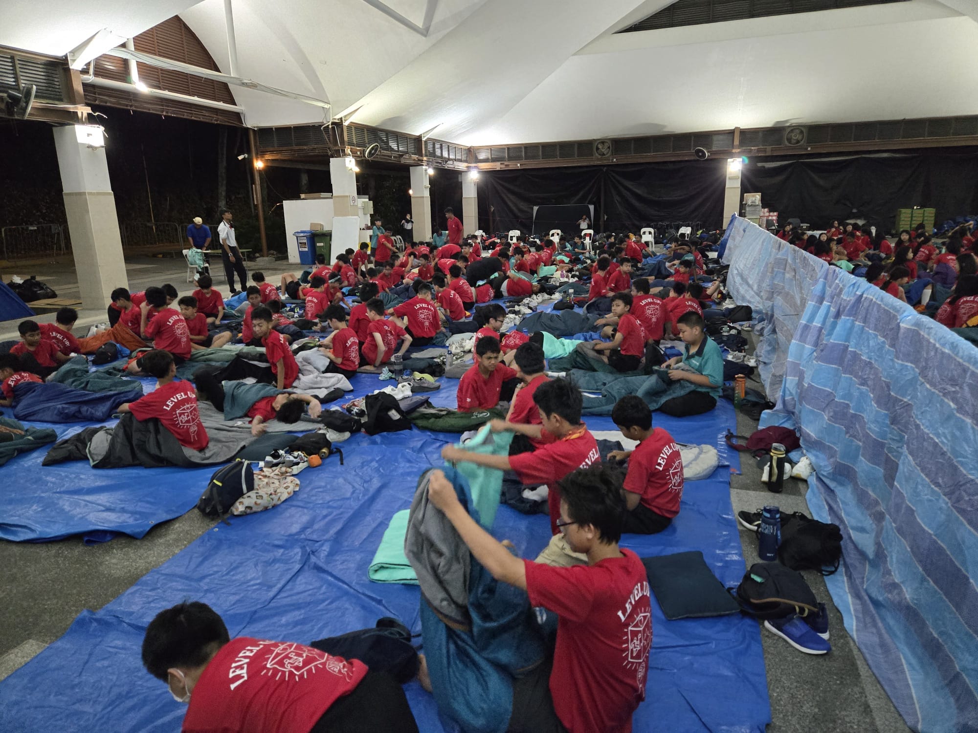 A group of students preparing for lights out at Sec 1 Camp
