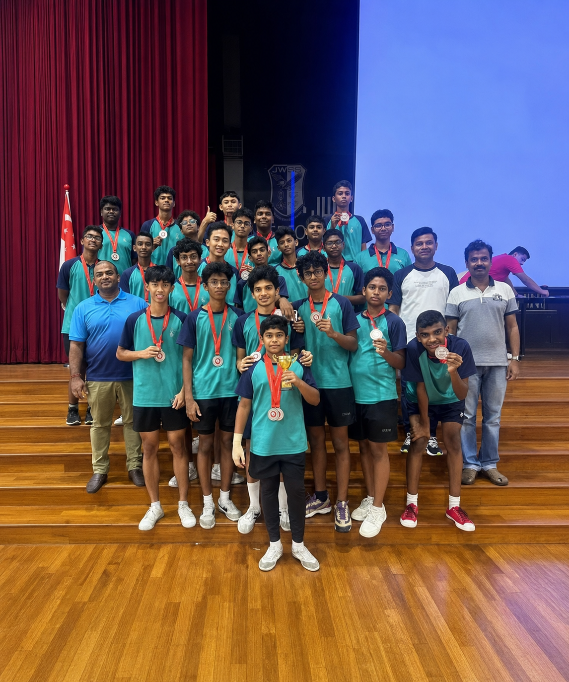 National Kabbadi competition winners posing with their medals and teachers