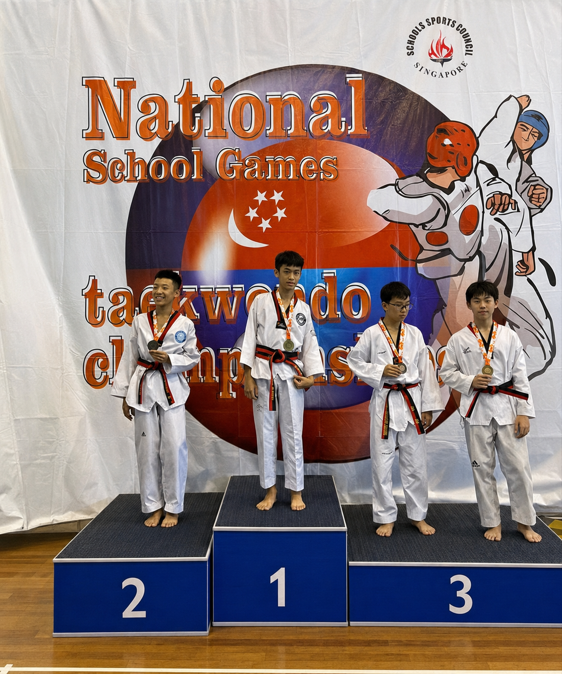4 boys on medal podium