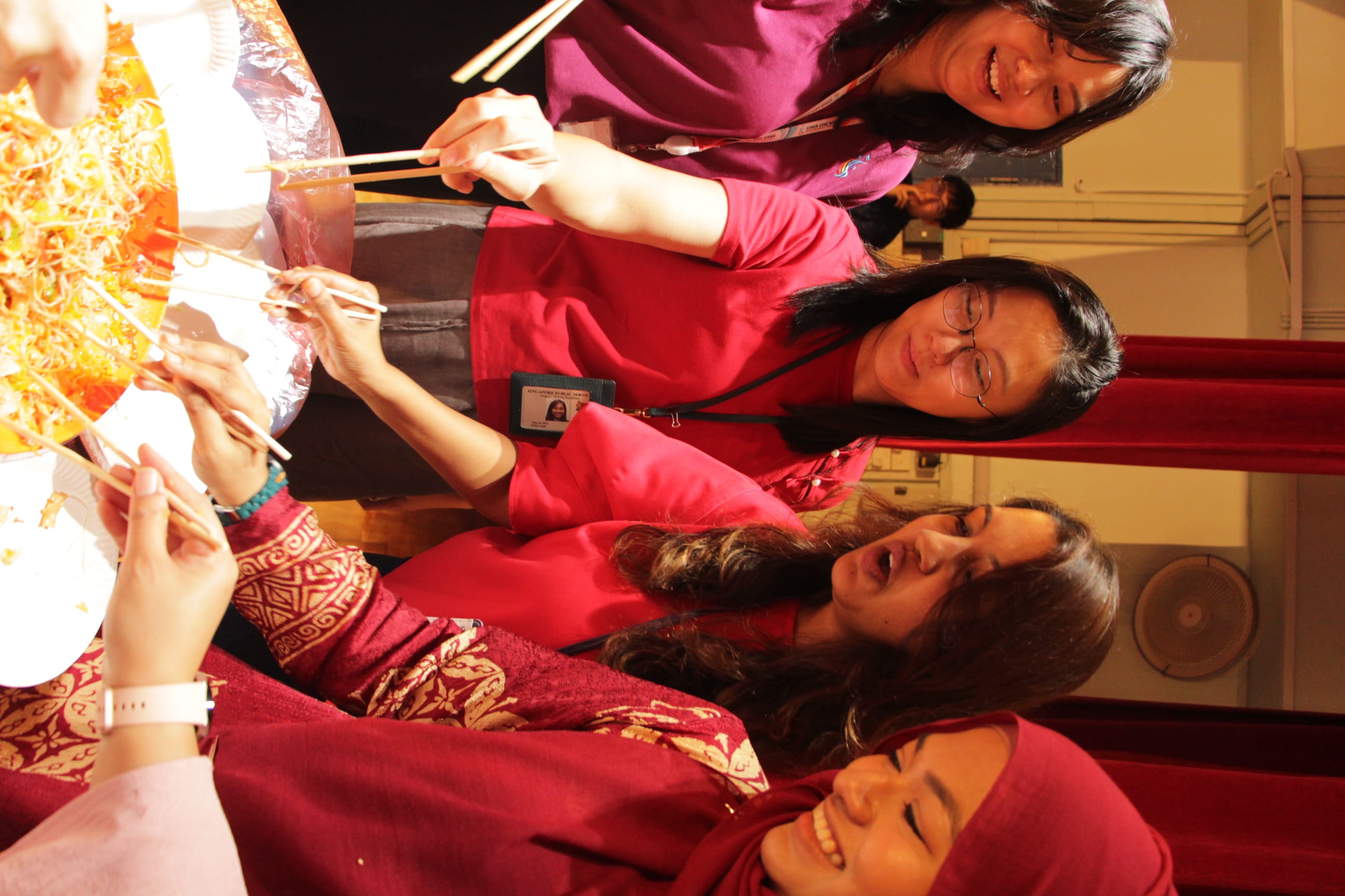Staff toss lohei together