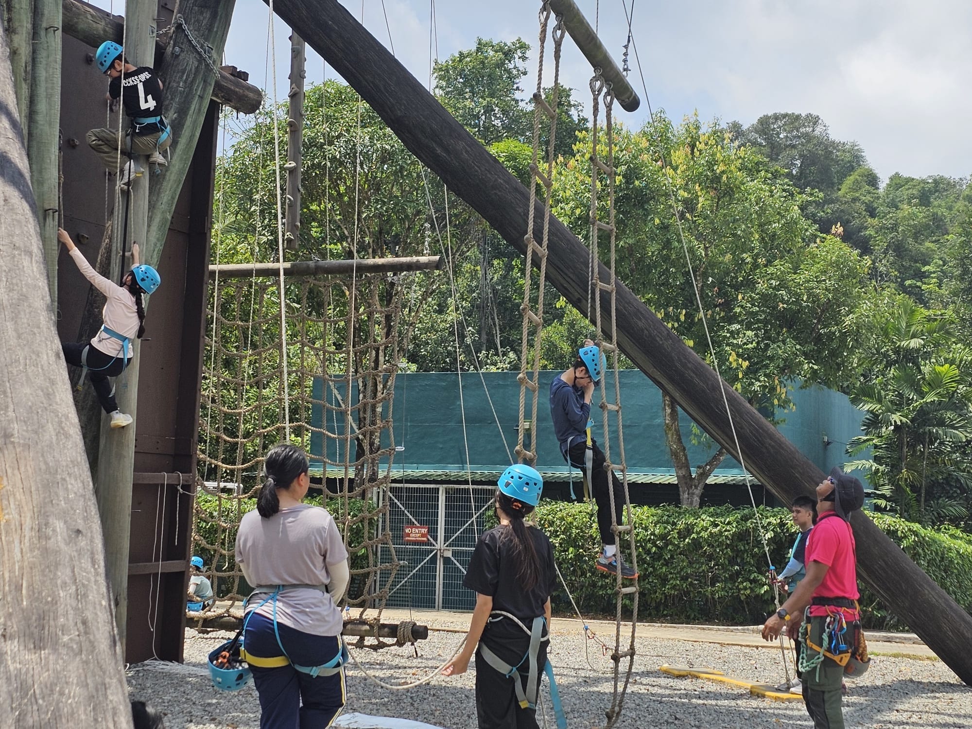 a group of students do high elements