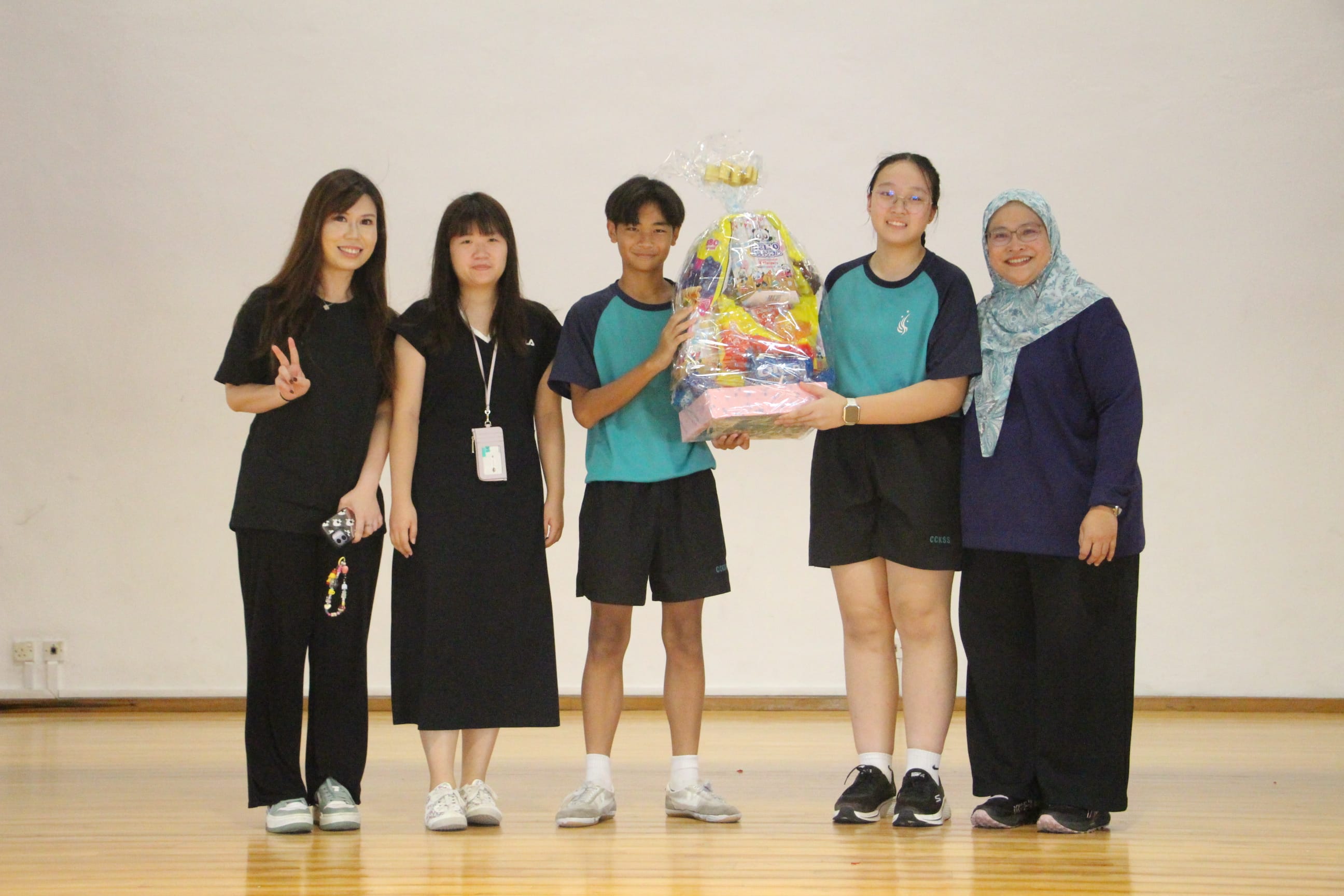 class winners pose with their prize