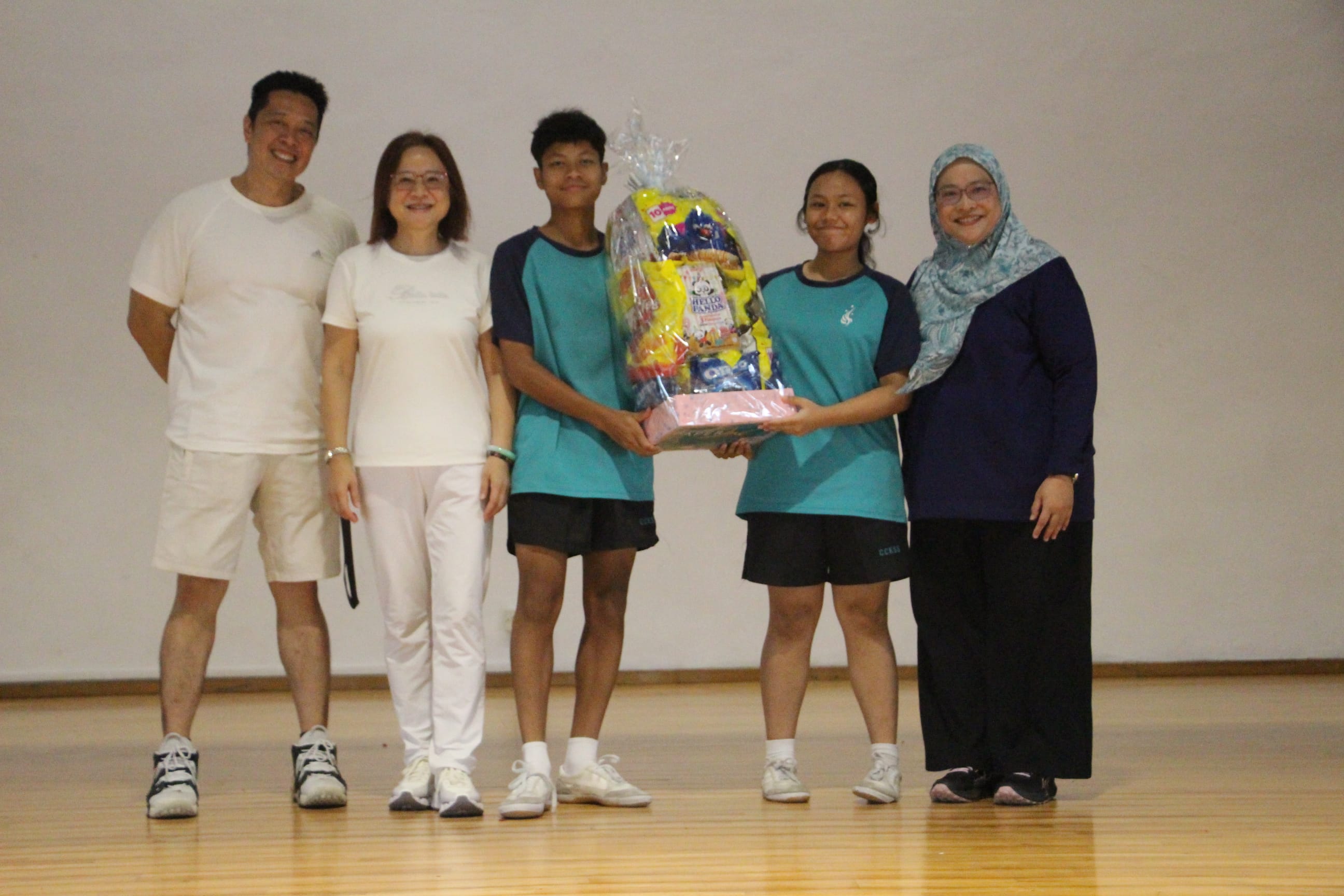 class winners pose with their prize