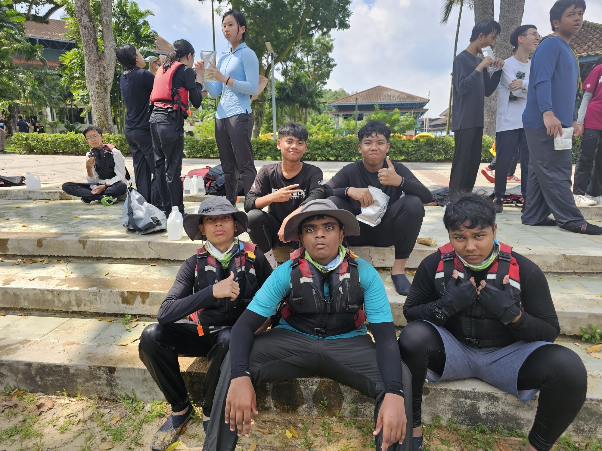 a group of students posing after doing kayaking