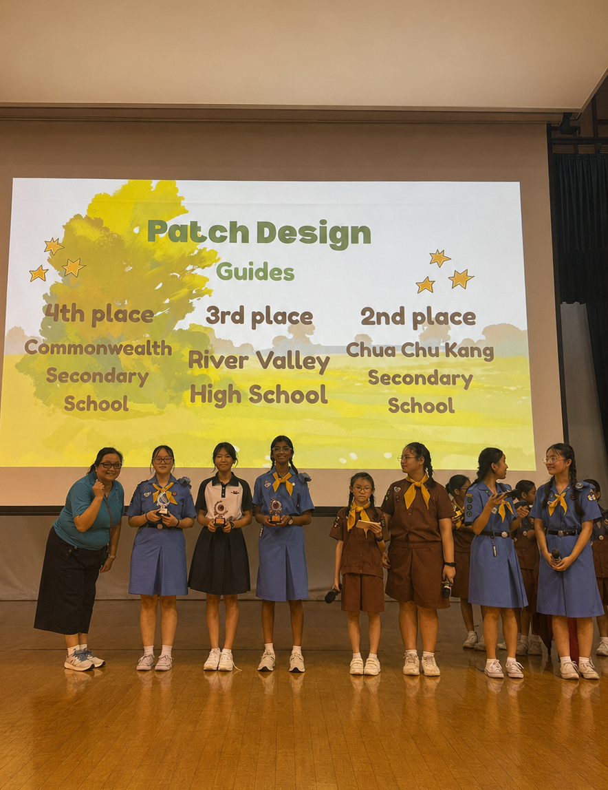 eight girl guides on a stage