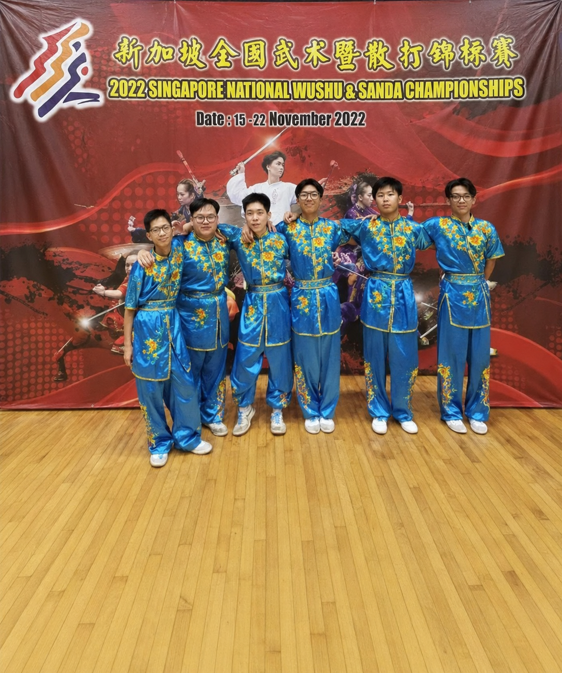 6 boys in wushu blue costume