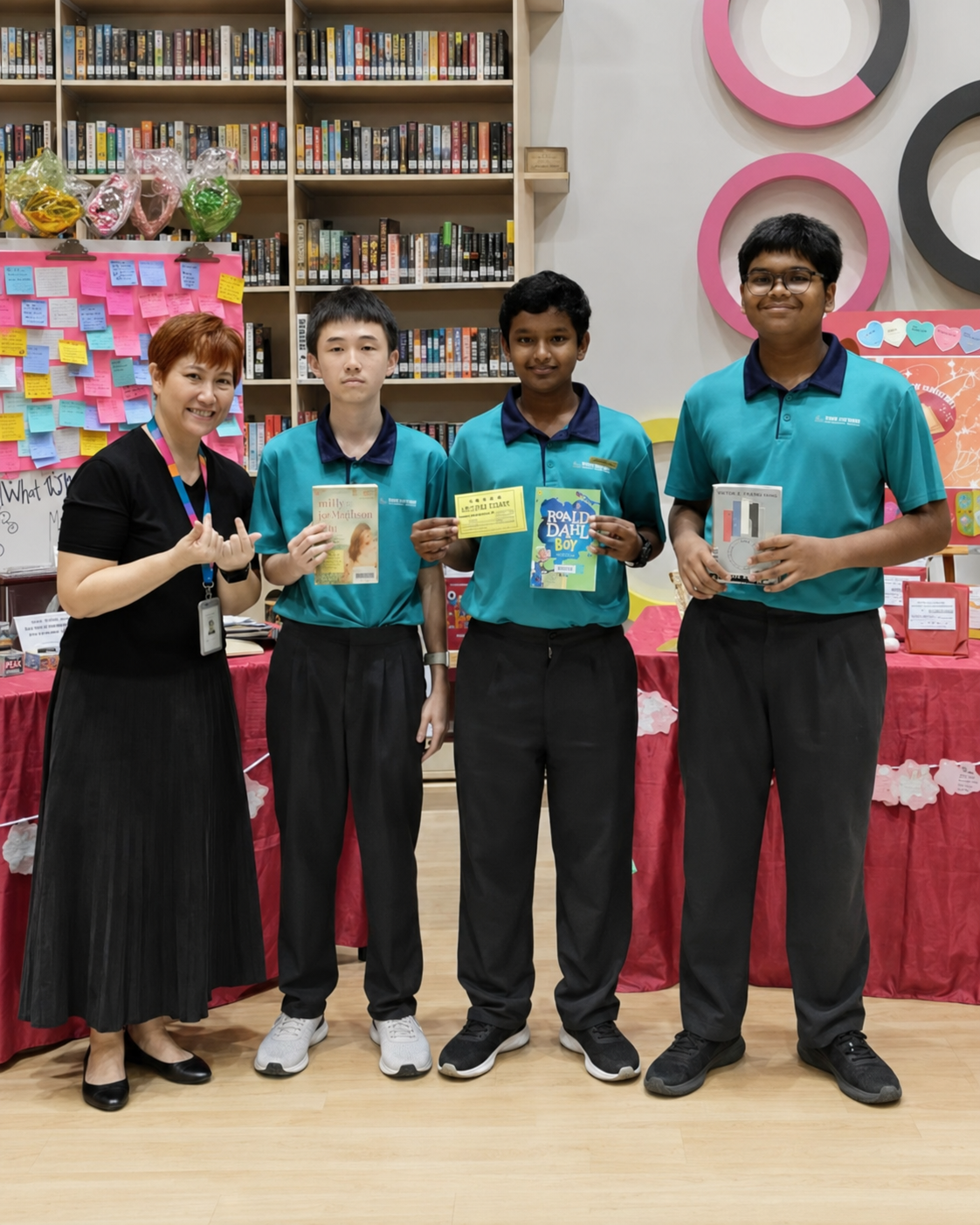 1 adult and three boys with the Golden Ticket