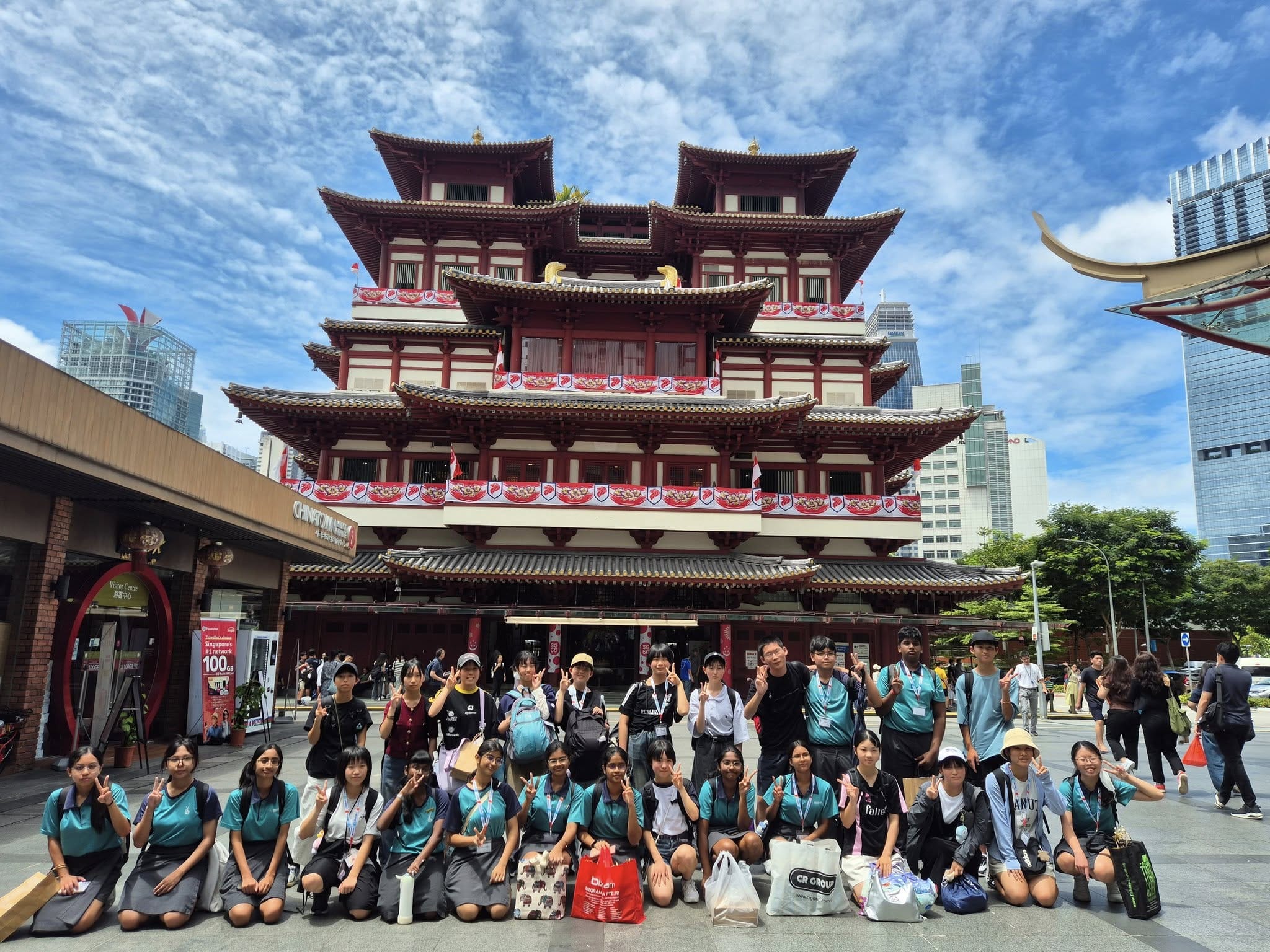 Students posing in front of Buddha Tooth Relic Temple