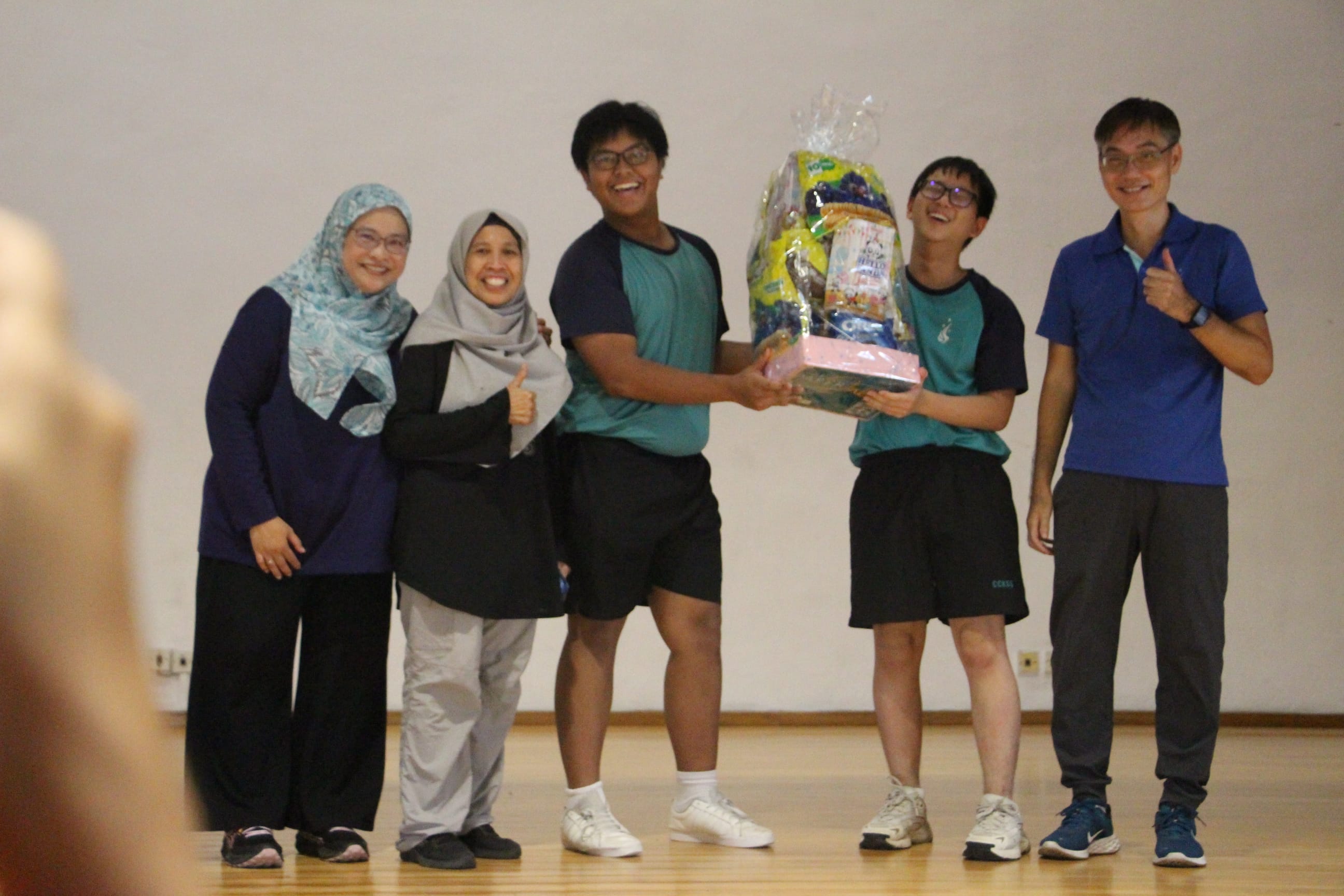 class winners pose with their prize