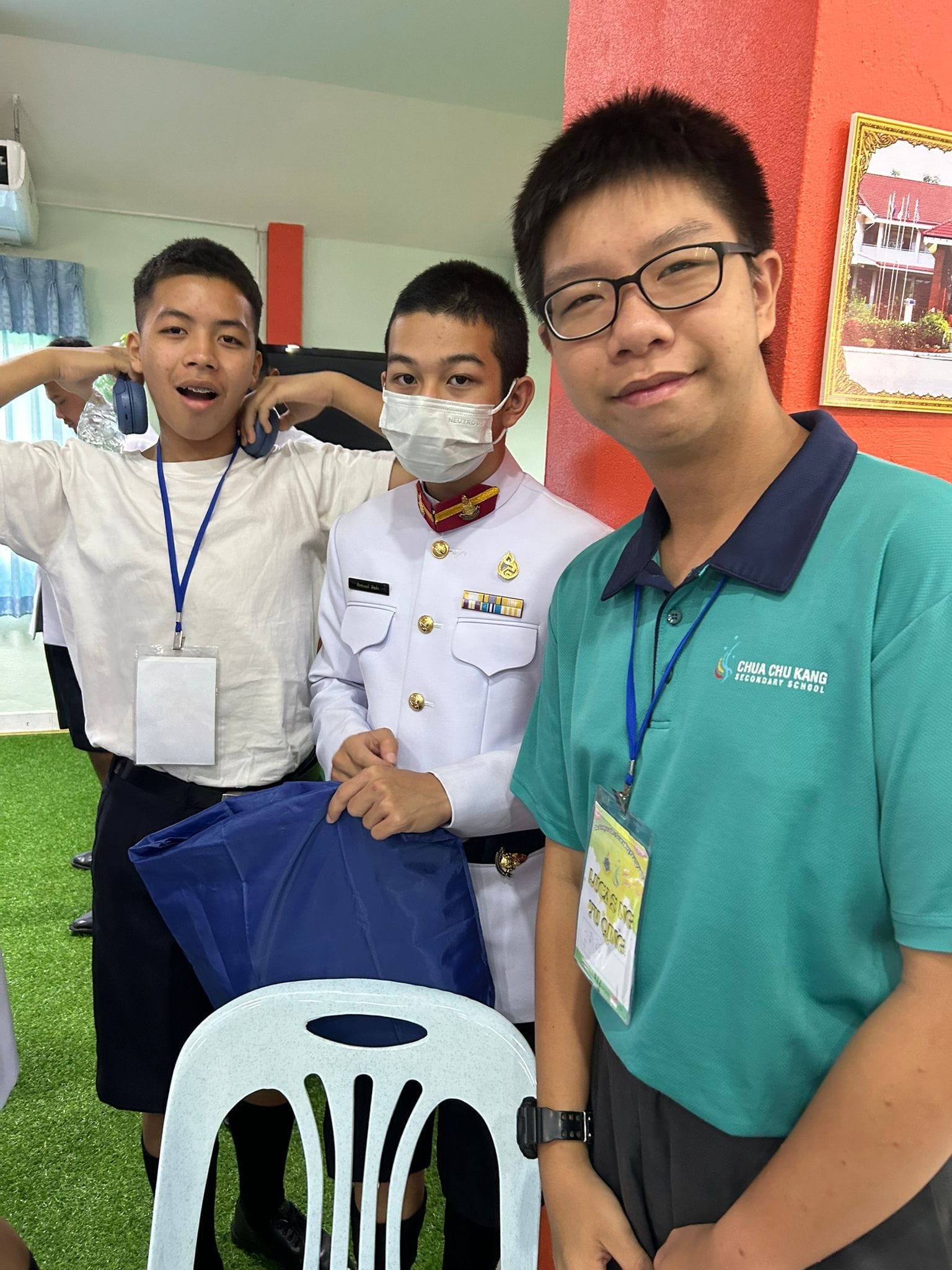 3 boys pose for a photo
