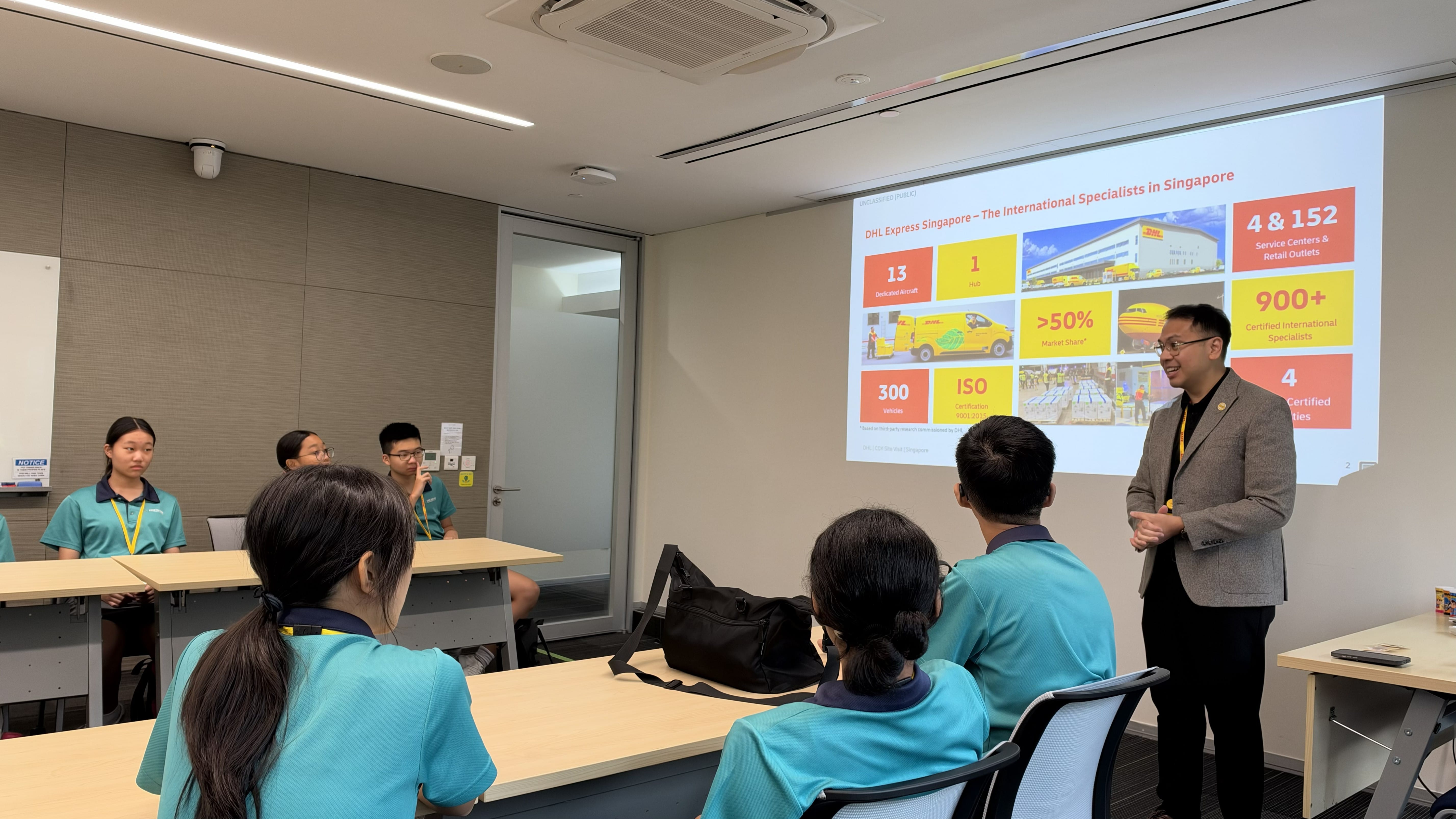 students learning about logistics at DHL