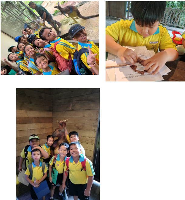 Children in yellow uniforms on a zoo field trip, posing near animals and completing worksheets.
