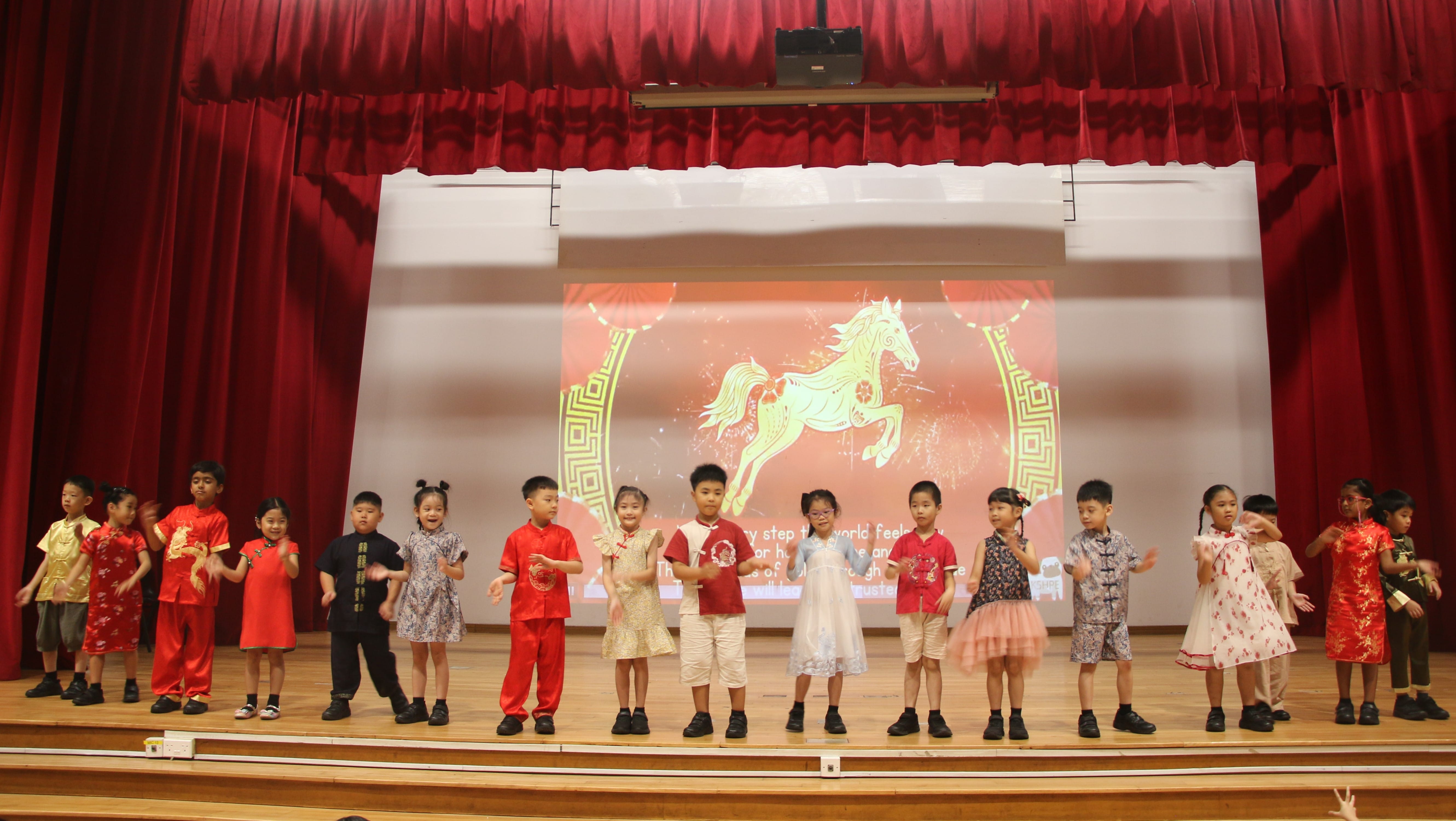 Galloping into the Year of the Horse with the auspicious lion dance and our little ones performing on stage!