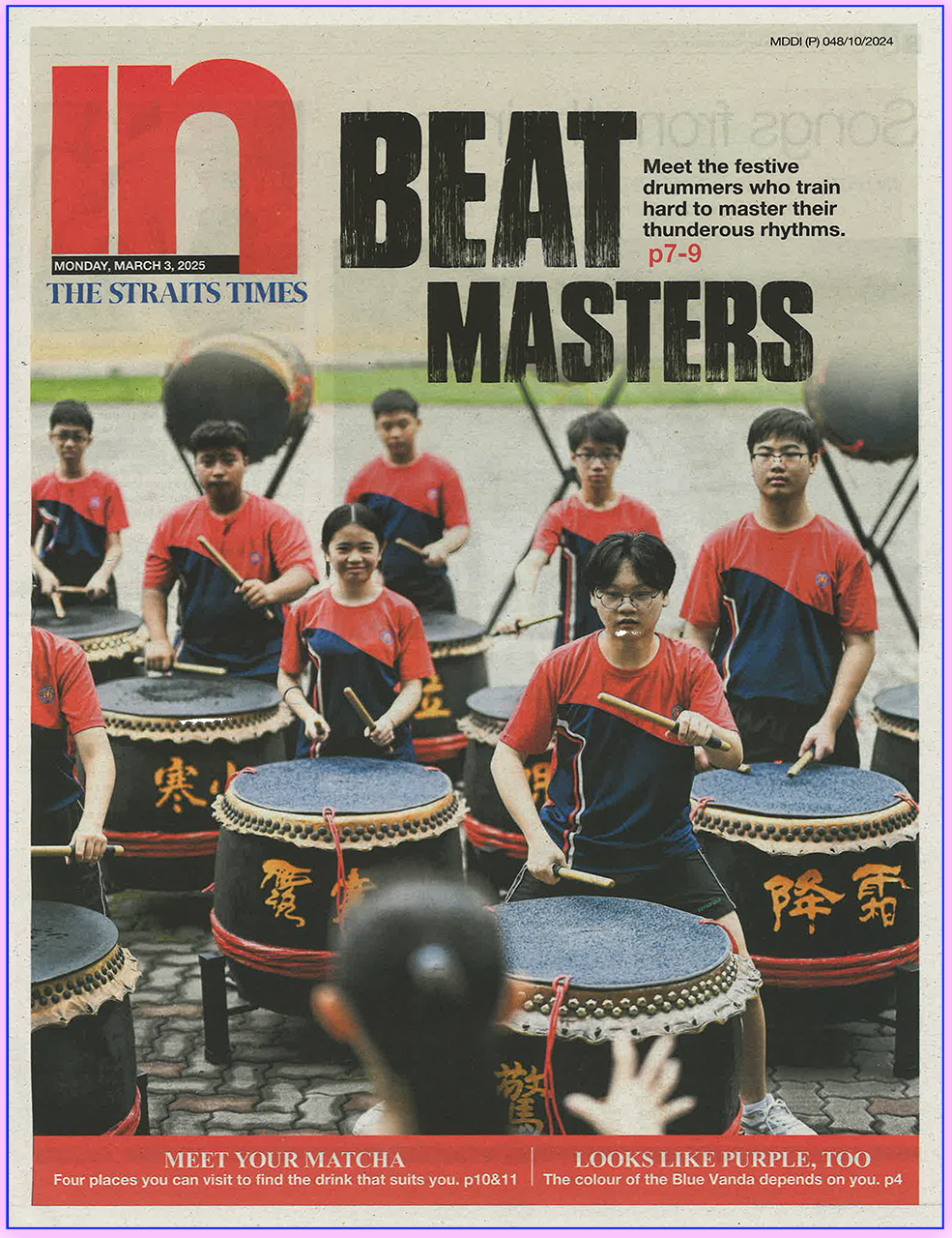 The Straits Times In magazine cover dated March 3, 2025, showing youth in red uniforms playing large Chinese drums outdoors.