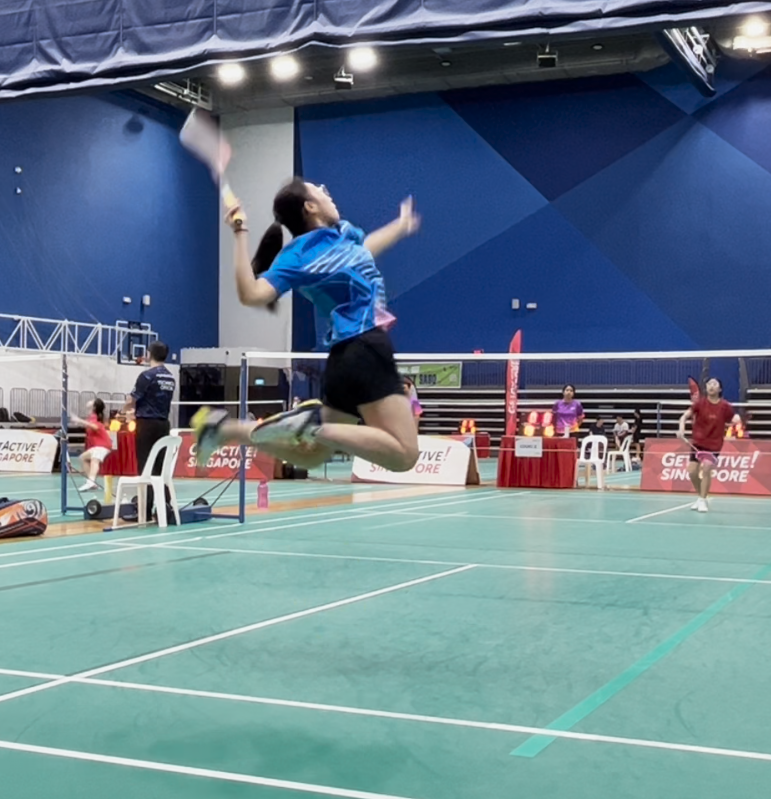 Girl hitting with a racket