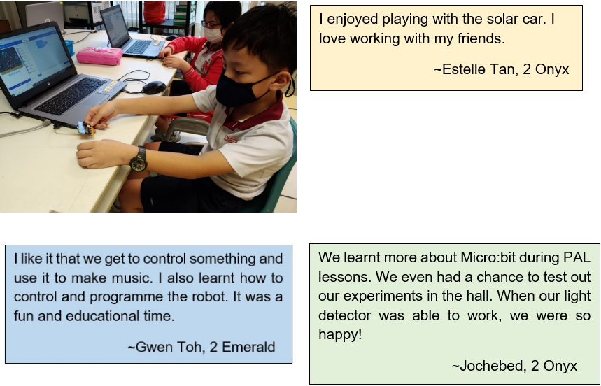 Two masked students work at a desk with laptops and a small device, alongside three text quotes from classmates.