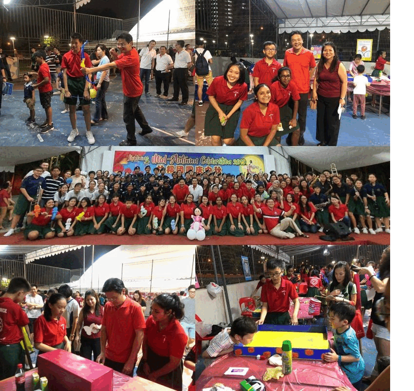 A large group in red polo shirts gathers for a Mid-Autumn Celebration outdoors at night, with activities and game booths.